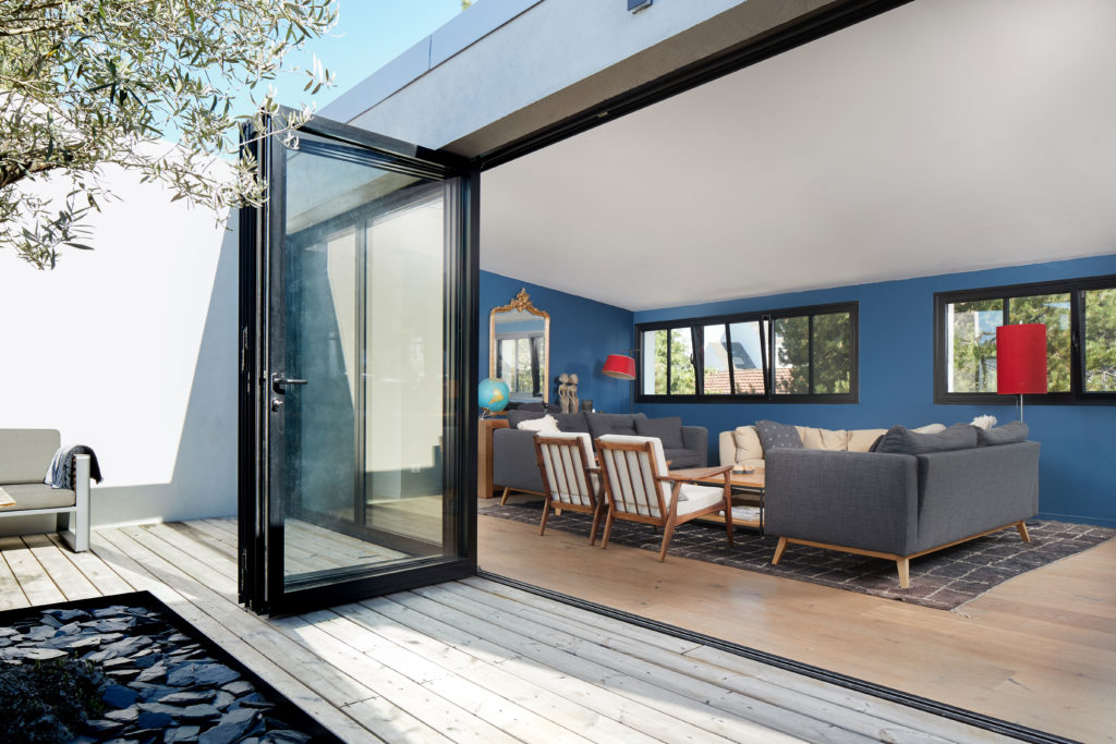 Bifold doors opening onto landscaped garden